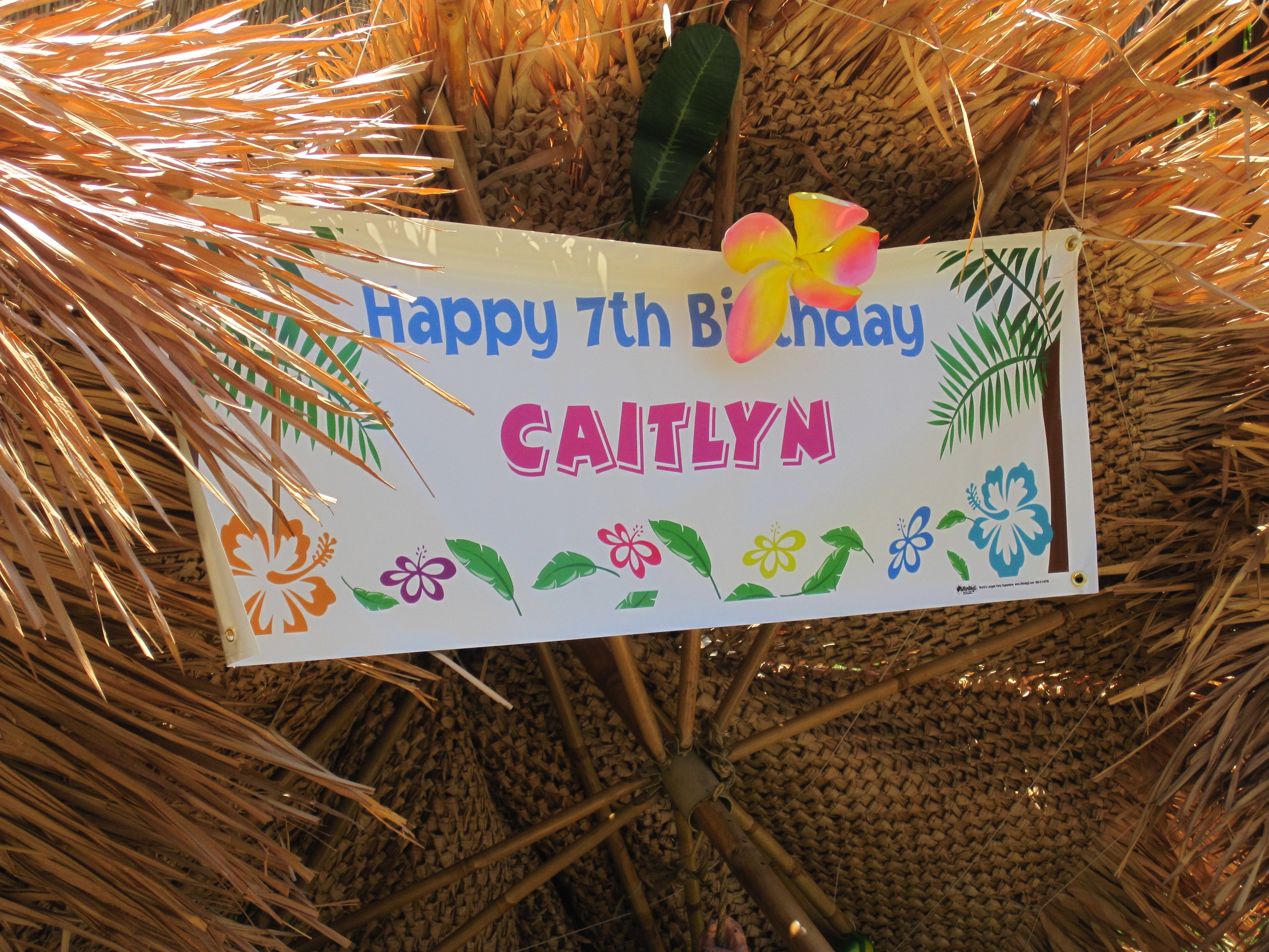 Backyard luau tropical decorations, tiki props, and floral setup in Summerlin, Las Vegas